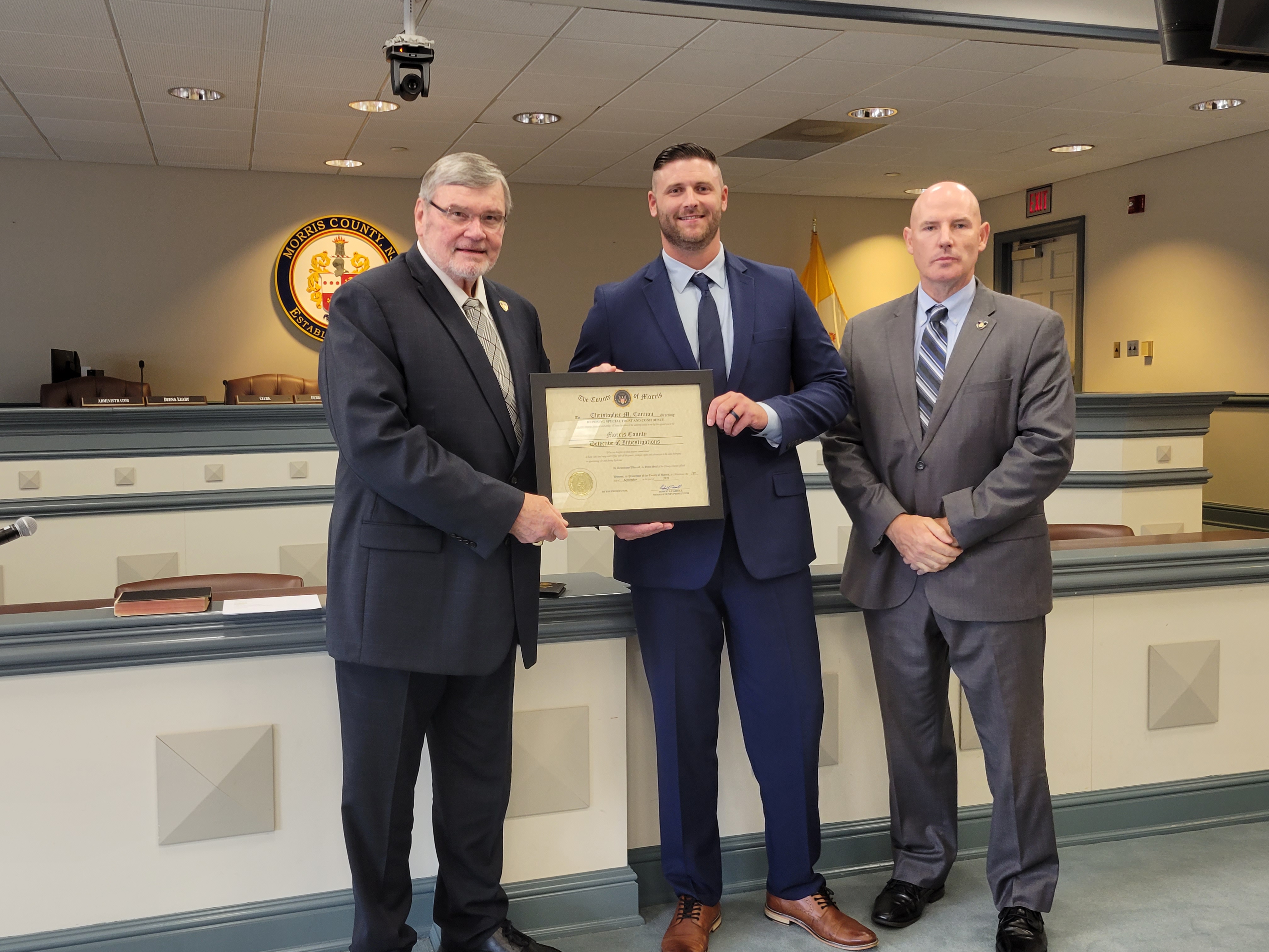 Prosecutor Robert Carroll, Det. Christopher Cannon, and Chief of Detectives Robert McNally